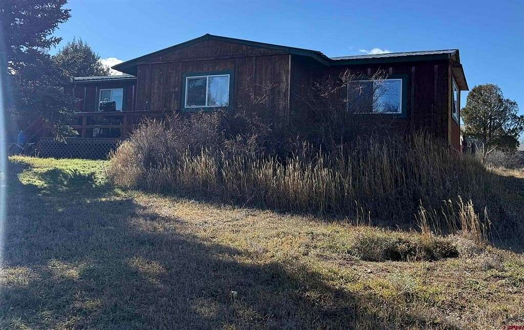 3 Acres of Residential Land with Home for Sale in Mancos, Colorado