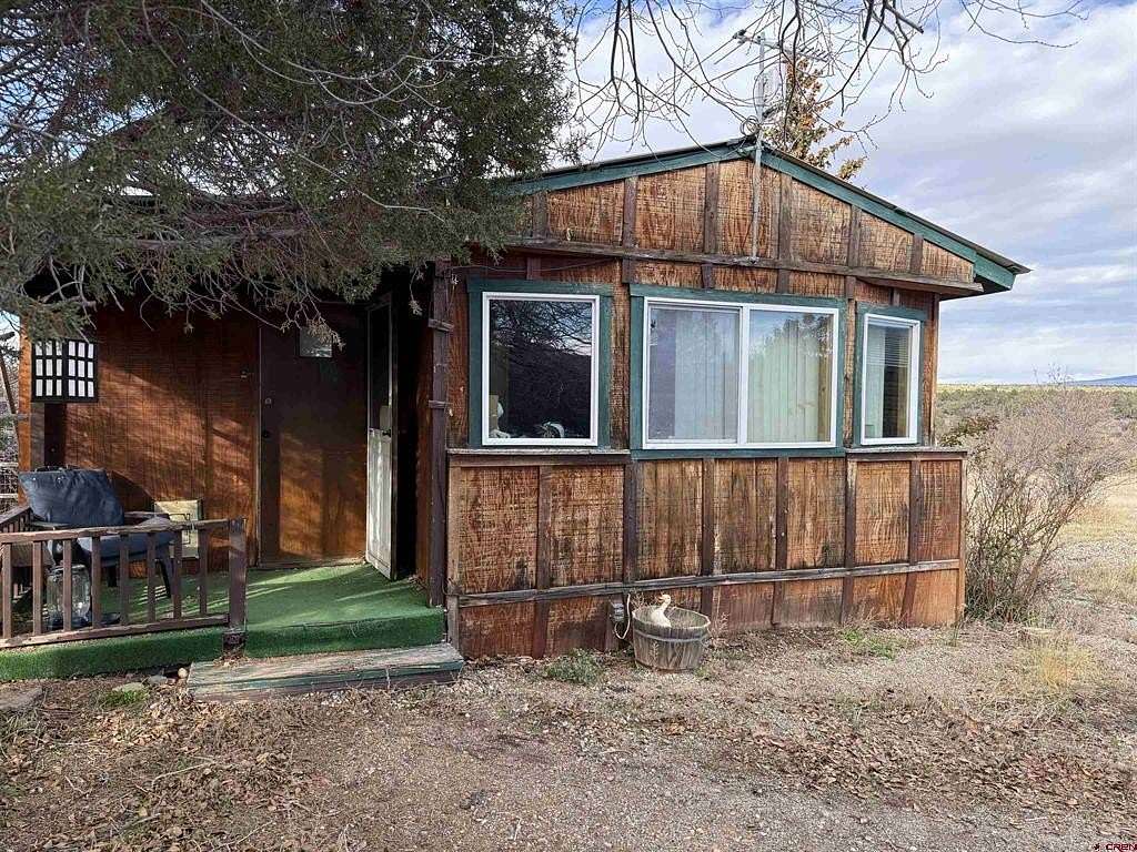 3 Acres of Residential Land with Home for Sale in Mancos, Colorado