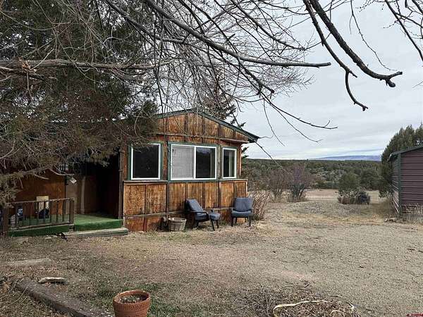 3 Acres of Residential Land with Home for Sale in Mancos, Colorado