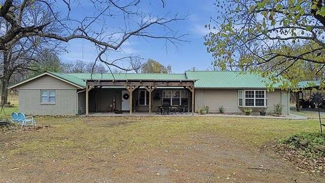 8.46 Acres of Land with Home for Sale in Chouteau, Oklahoma