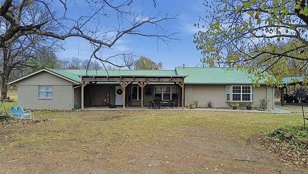 8.46 Acres of Land with Home for Sale in Chouteau, Oklahoma