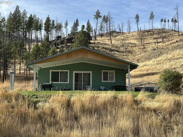21.9 Acres of Agricultural Land with Home for Sale in Canyon City, Oregon