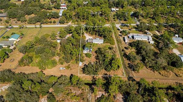 2 Acres of Residential Land with Home for Sale in Fort Denaud, Florida