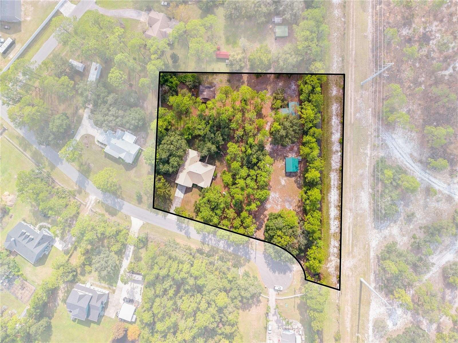 2.27 Acres of Land with Home for Sale in St. Cloud, Florida