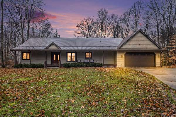 10 Acres of Recreational Land with Home for Sale in Ravenna, Michigan