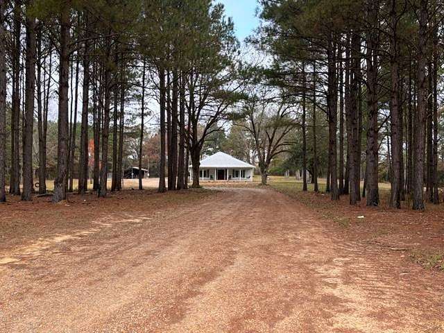 7.3 Acres of Residential Land with Home for Sale in Philadelphia, Mississippi