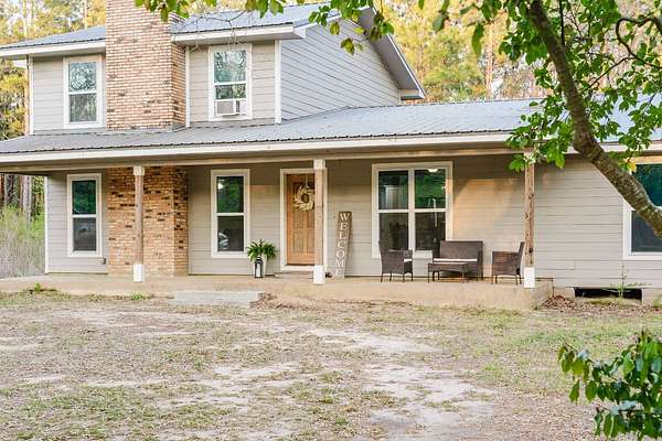 27.6 Acres of Land with Home for Sale in Florien, Louisiana