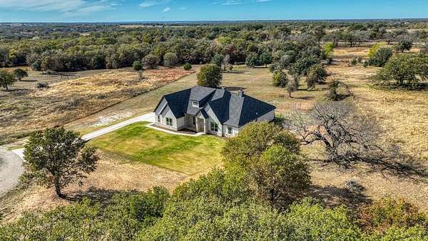 2.45 Acres of Residential Land with Home for Sale in Poolville, Texas