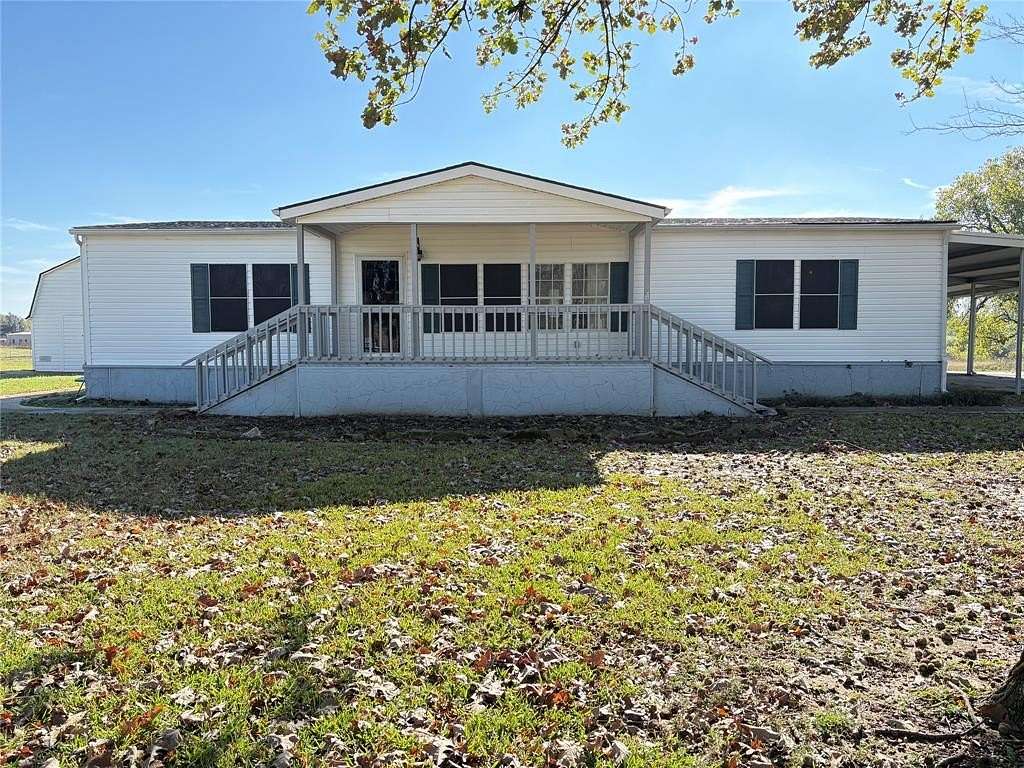 5 Acres of Residential Land with Home for Sale in Combine, Texas