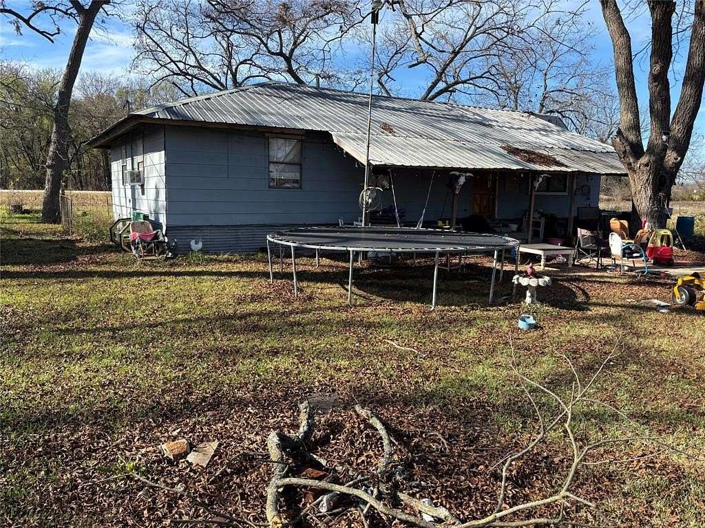 5.6 Acres of Residential Land with Home for Sale in Bonham, Texas