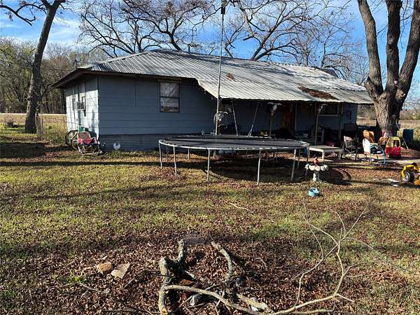5.6 Acres of Land with Home for Sale in Bonham, Texas