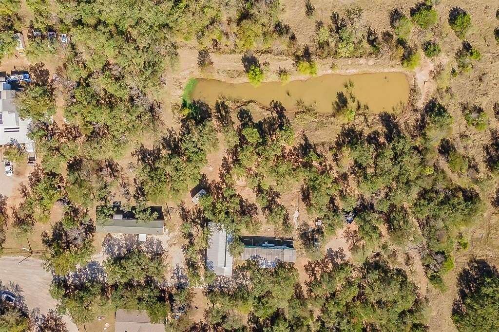 1.9 Acres of Residential Land with Home for Sale in Millsap, Texas