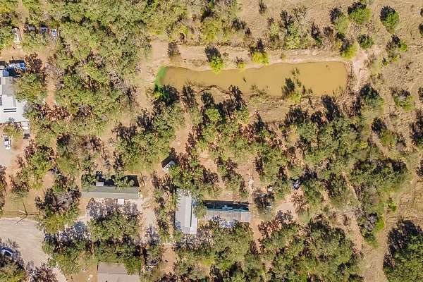 1.9 Acres of Residential Land with Home for Sale in Millsap, Texas