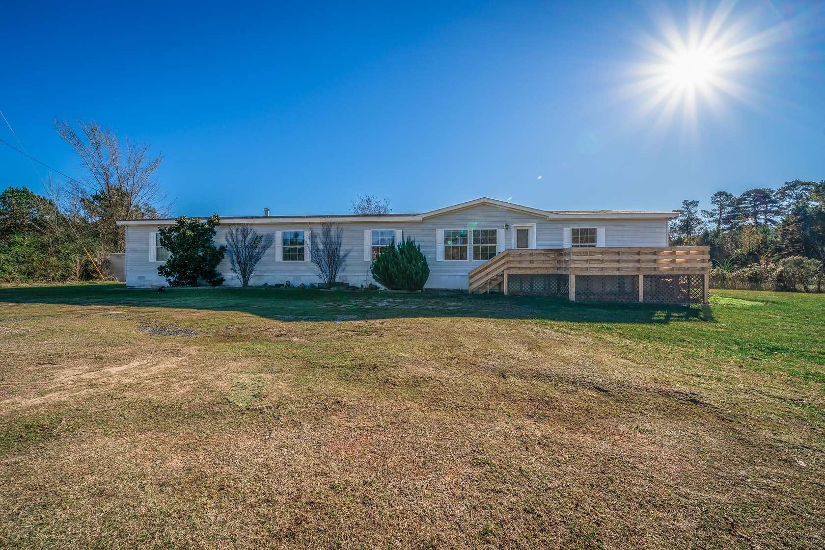 5.42 Acres of Residential Land with Home for Sale in Tatum, Texas