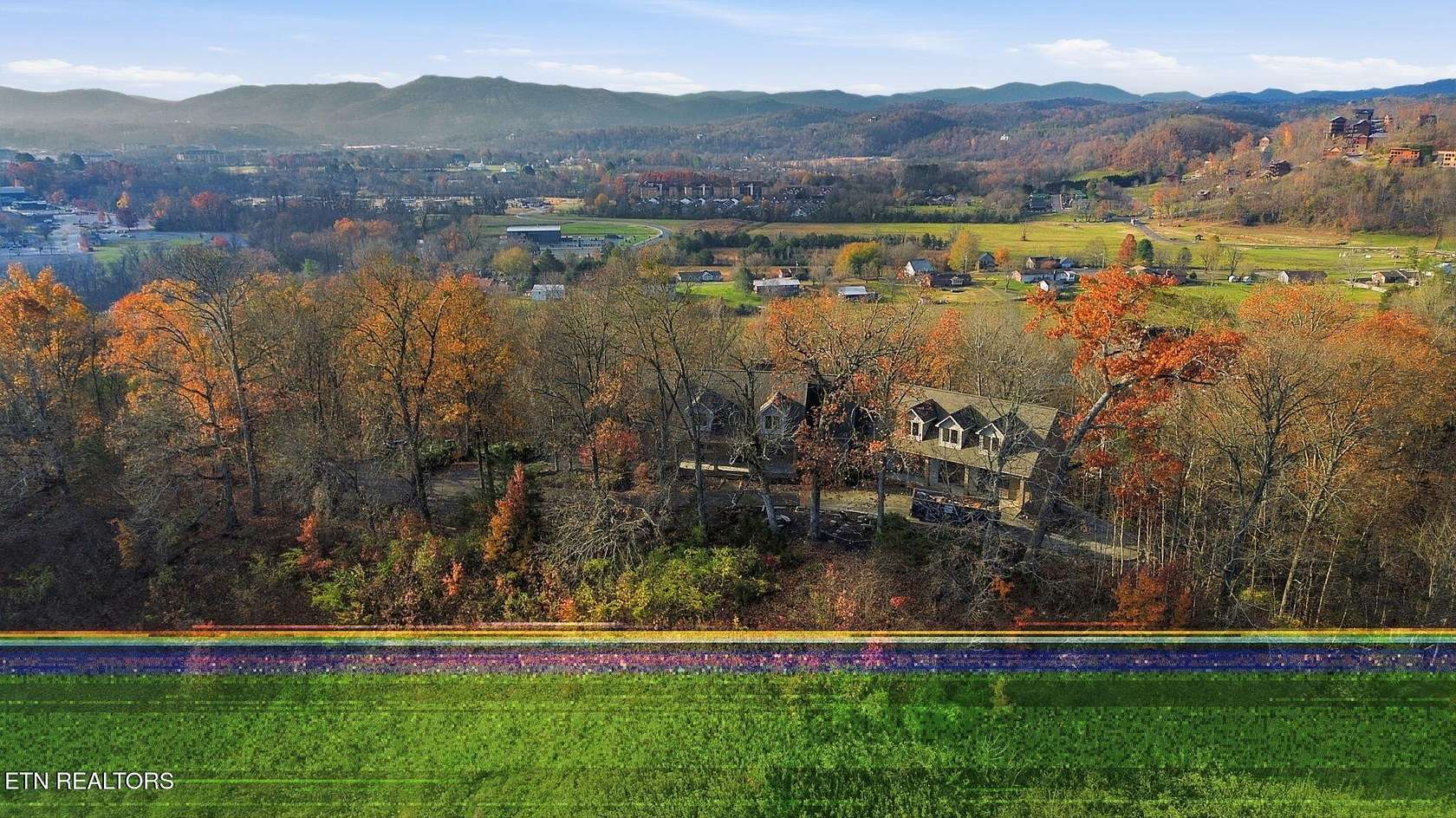 7.86 Acres of Land with Home for Sale in Sevierville, Tennessee