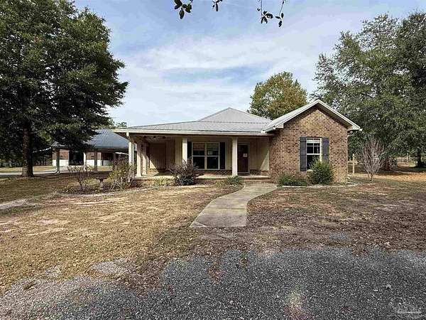 3.44 Acres of Residential Land with Home for Sale in Milton, Florida