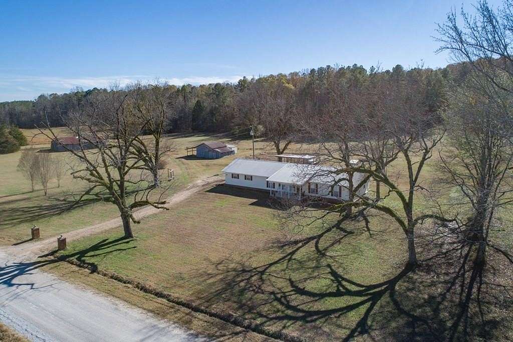 65 Acres of Recreational Land with Home for Sale in Calhoun City, Mississippi