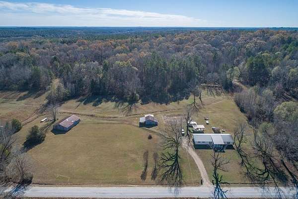 65 Acres of Recreational Land with Home for Sale in Calhoun City, Mississippi