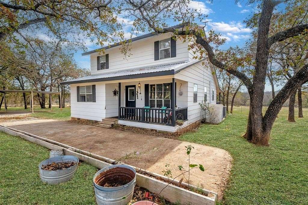 7.12 Acres of Land with Home for Sale in Springtown, Texas