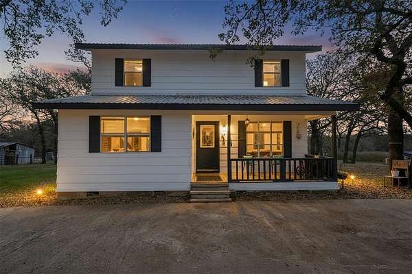 7.12 Acres of Residential Land with Home for Sale in Springtown, Texas