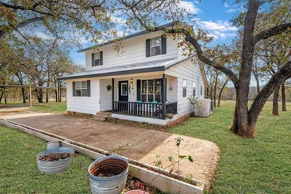 7.12 Acres of Land with Home for Sale in Springtown, Texas