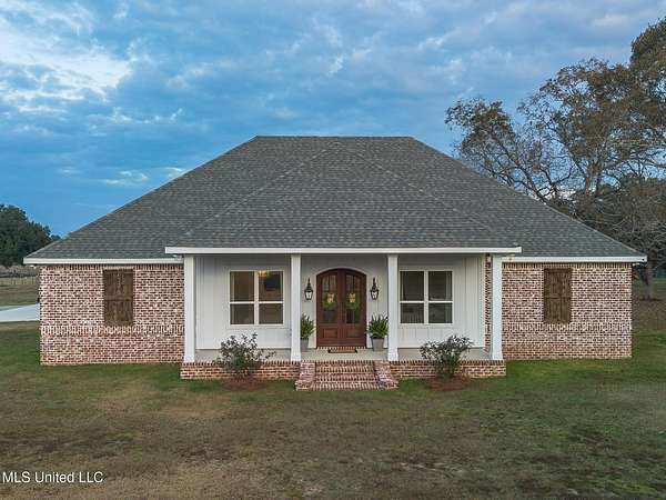 8.8 Acres of Residential Land with Home for Sale in Saucier, Mississippi