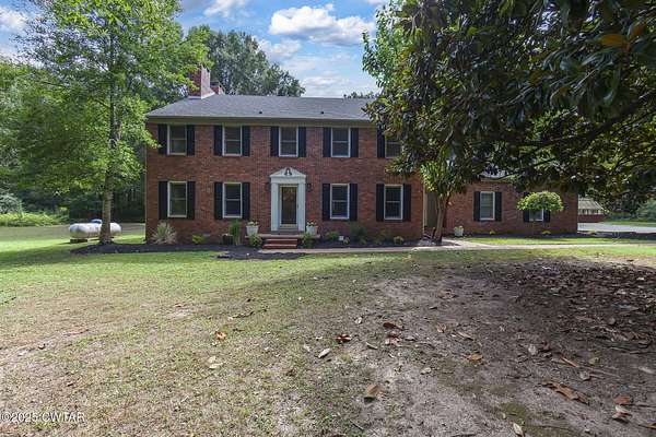 3.8 Acres of Residential Land with Home for Sale in Jackson, Tennessee