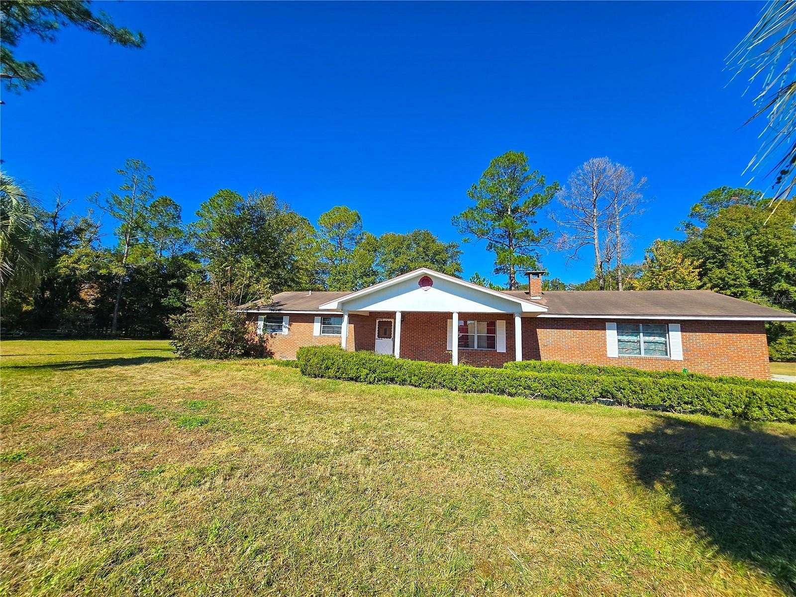 12.9 Acres of Land with Home for Sale in Hampton, Florida