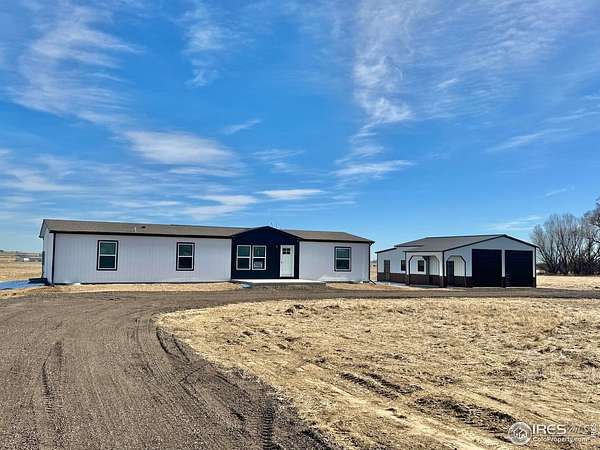 4.8 Acres of Residential Land with Home for Sale in Weldona, Colorado