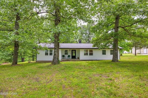 31 Acres of Recreational Land with Home for Sale in Joplin, Missouri