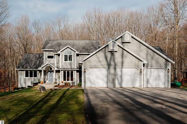 9.8 Acres of Residential Land with Home for Sale in Traverse City, Michigan