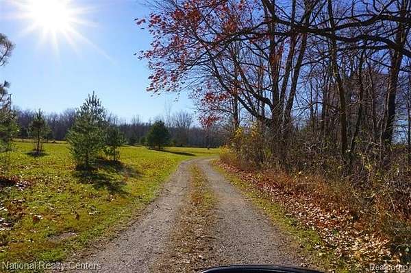 10 Acres of Land with Home for Sale in Fowlerville, Michigan