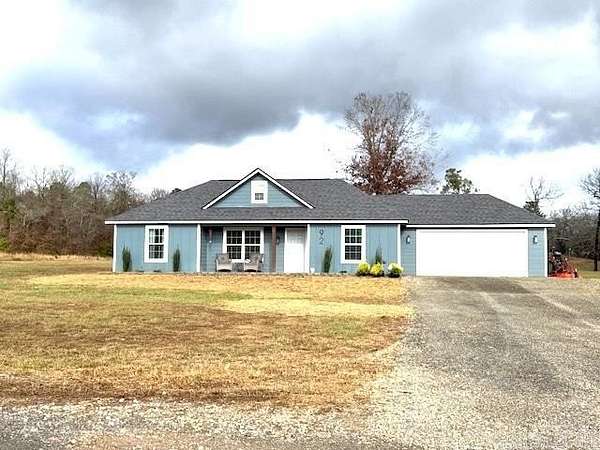 3.59 Acres of Land with Home for Sale in Story, Arkansas