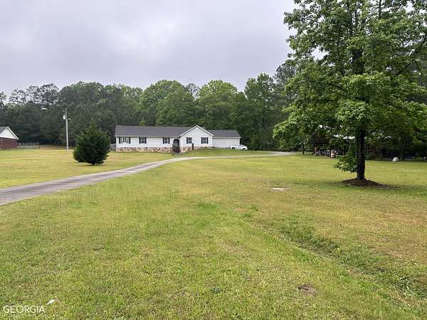 2.64 Acres of Residential Land with Home for Sale in Gay, Georgia