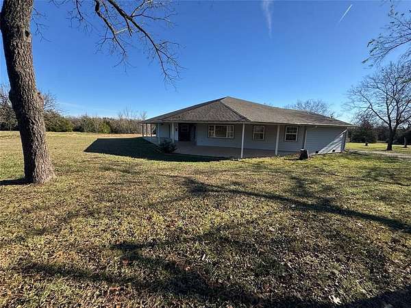 10 Acres of Residential Land with Home for Sale in Prague, Oklahoma