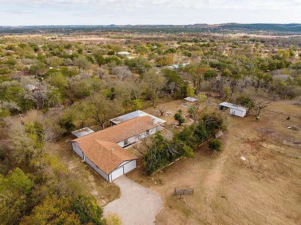 2.77 Acres of Residential Land with Home for Sale in Center Point, Texas