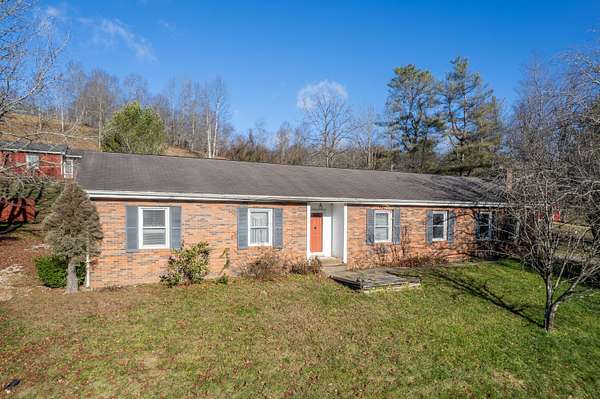 2.7 Acres of Residential Land with Home for Sale in Olive Hill, Kentucky