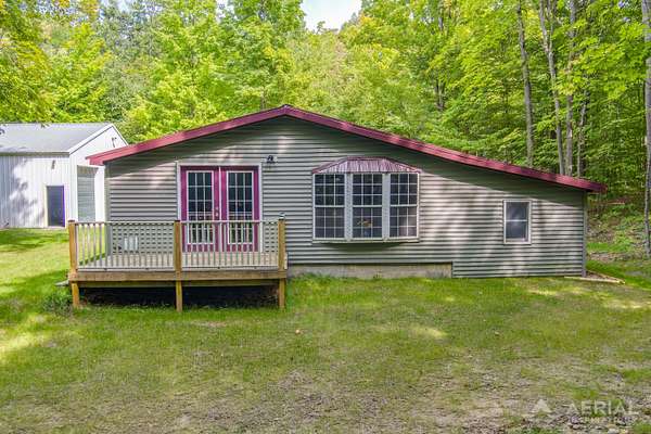 9.75 Acres of Residential Land with Home for Sale in Rose City, Michigan