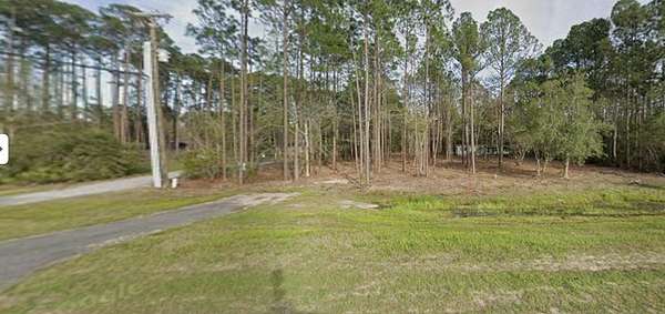 0.69 Acres of Mixed-Use Land for Sale in Freeport, Florida
