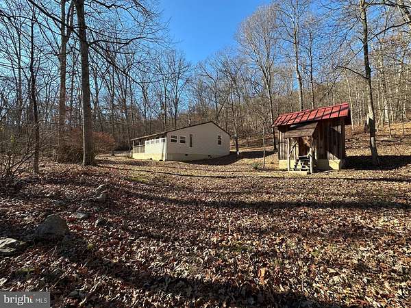 5.8 Acres of Residential Land with Home for Sale in Green Spring, West Virginia