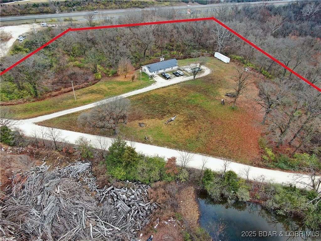 4.9 Acres of Residential Land with Home for Sale in Eldon, Missouri