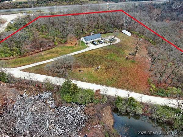 4.9 Acres of Residential Land with Home for Sale in Eldon, Missouri