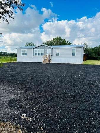3.75 Acres of Residential Land with Home for Sale in Clewiston, Florida