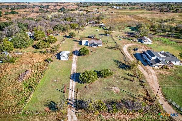 5.1 Acres of Residential Land with Home for Sale in Oglesby, Texas