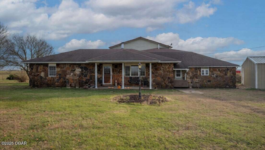 5 Acres of Residential Land with Home for Sale in Liberal, Missouri