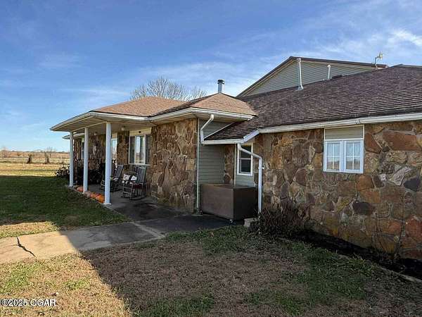 5 Acres of Residential Land with Home for Sale in Liberal, Missouri