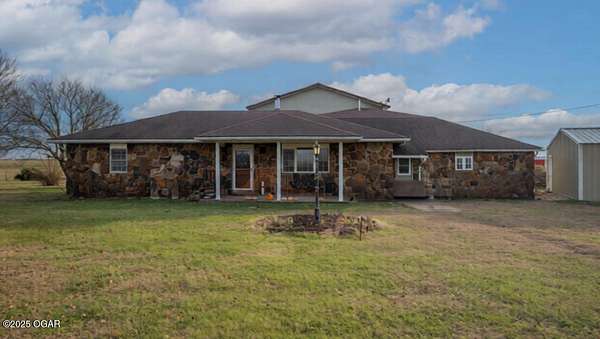 5 Acres of Residential Land with Home for Sale in Liberal, Missouri