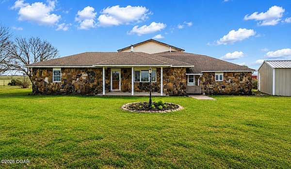 5 Acres of Land with Home for Sale in Liberal, Missouri