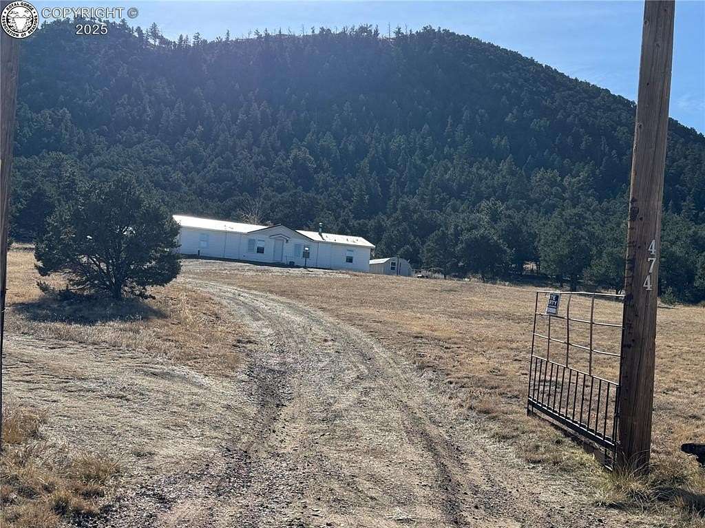 6.4 Acres of Residential Land with Home for Sale in Cotopaxi, Colorado
