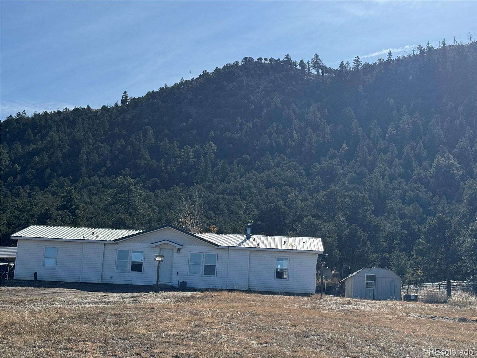 6.4 Acres of Land with Home for Sale in Cotopaxi, Colorado